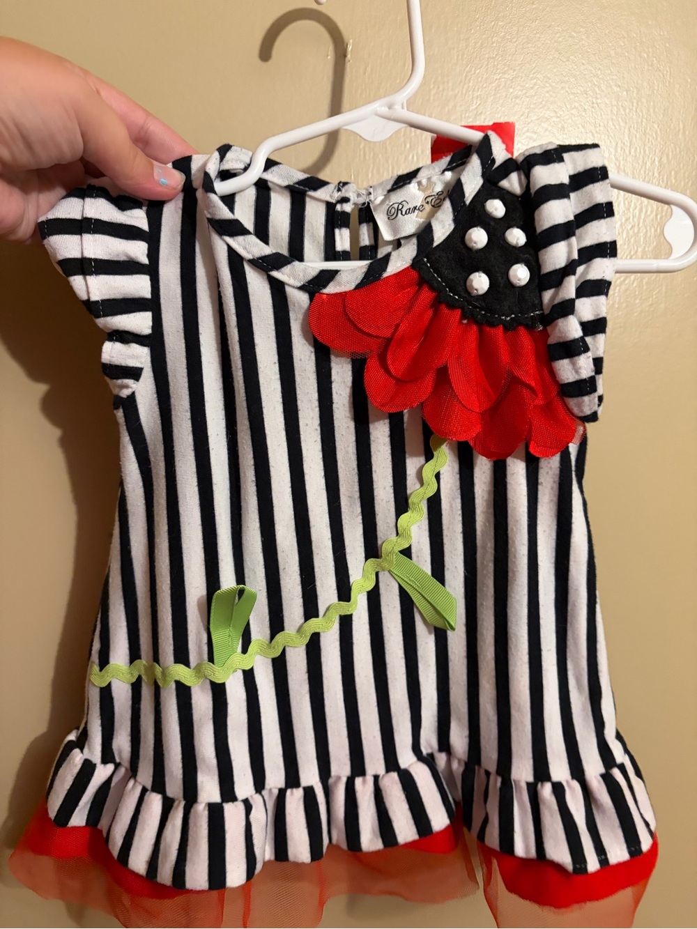 Girls Black & White Stripe Dress with Red Flower Accent